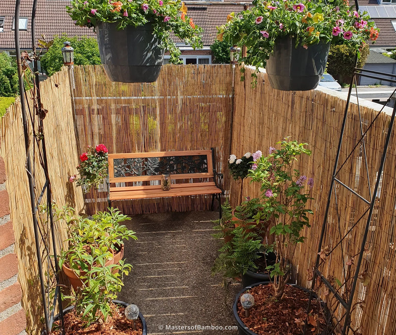 natuurlijke matten tegen balkonhek